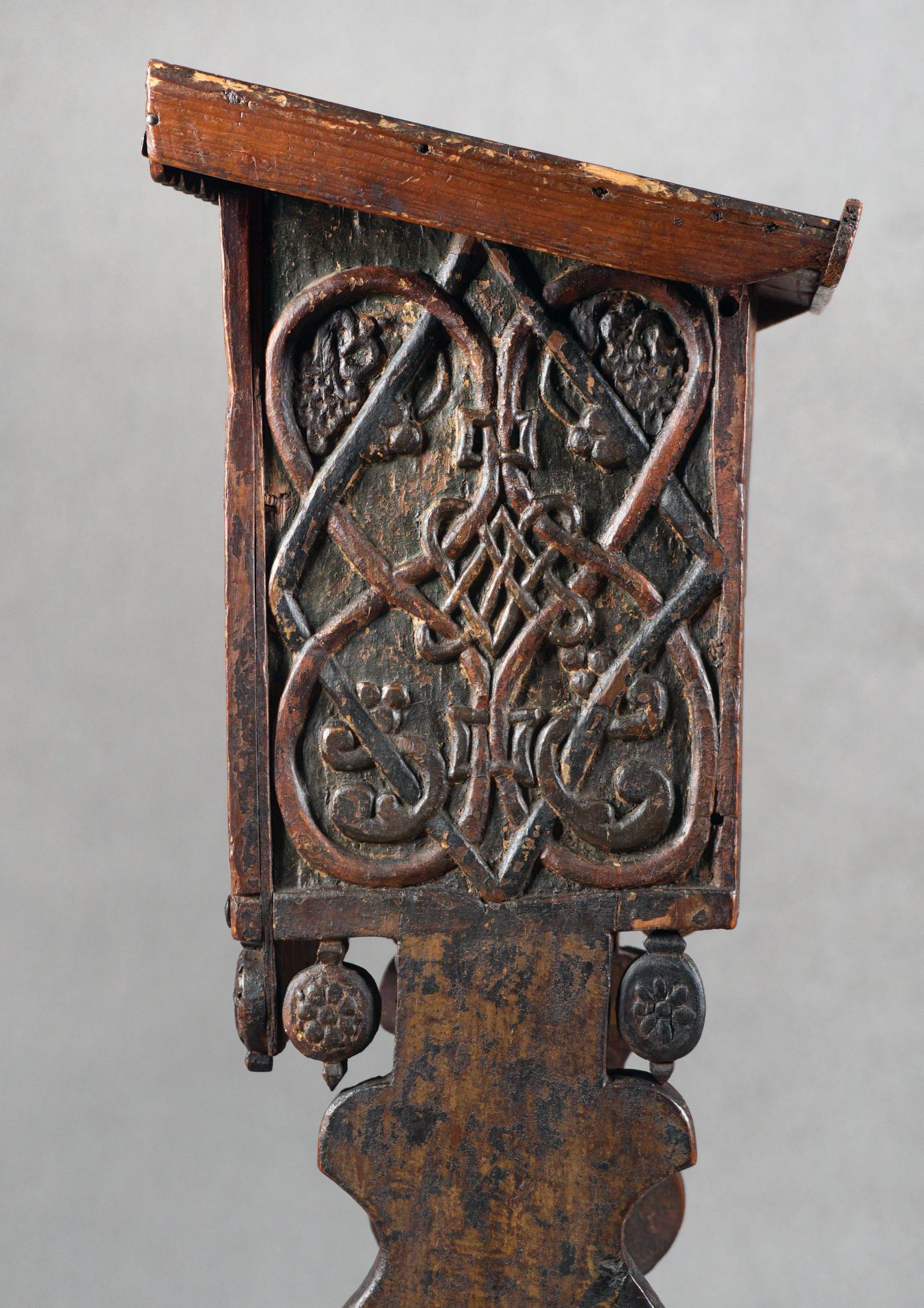 Wooden lectern with decorations.