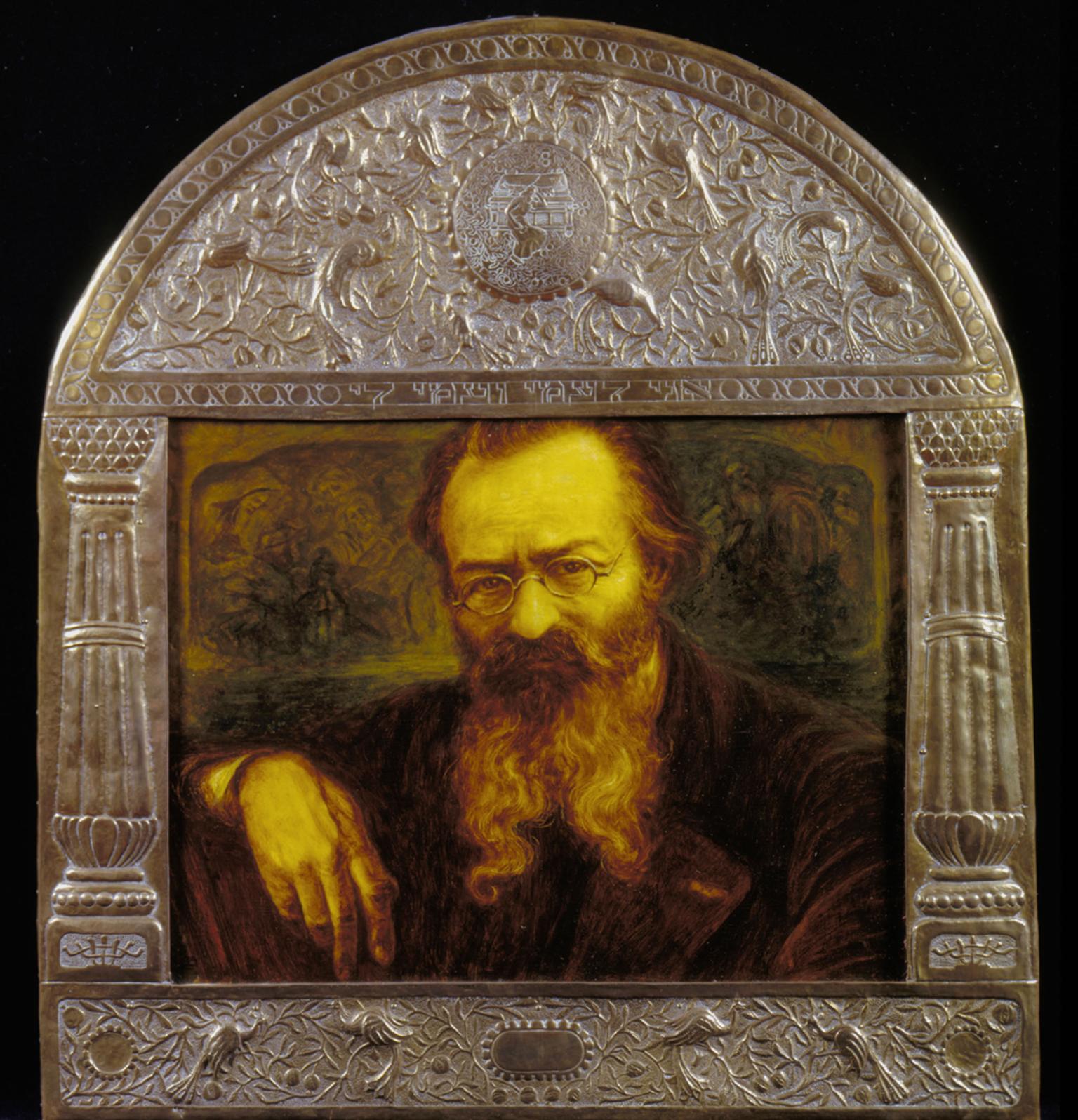 Painting of man in beard and glasses set inside an ornate frame with decorated border. 