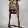 Wooden lectern with stork carving.
