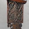 Wooden lectern with decorations.