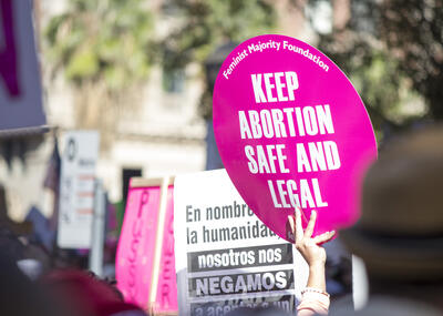 Signs at an abortion rights rally.