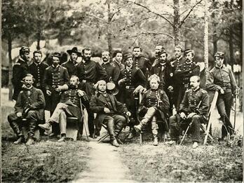 Union soldiers from the American Civil War in uniform, front row seated and back row standing.