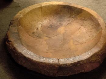 Inscribed Limestone Basin Basin with Hebrew inscription on rim