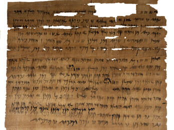 Papyrus page of Hebrew writing with some fragmentary sections.