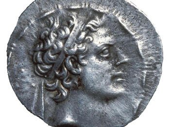Antiochus IV on Seleucid Coin Coin with man's profile.