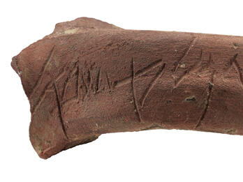 Jar handle inscribed with Hebrew.