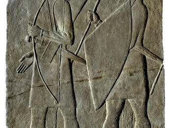 Judean Spearman Depicted on Relief of Sennacherib Relief with one archer holding bow and soldier with large triangular shield.