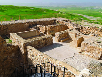 Photograph of ruins of stone buildings.