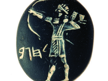 Seal with carving of archer shooting a bow and Hebrew inscription.