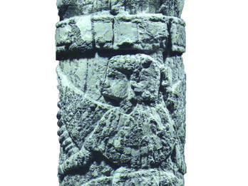 Bone Handle with Winged Humanoid Front of a bone handle with winged humanoid grasping branches of palm tree.