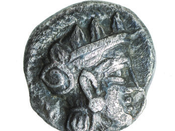 Coin with image of head wearing helmet.