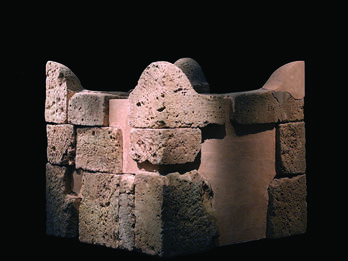 Altar of Hewn Sandstone (Ashlars) from Beersheba Reconstructed stone altar with horns at four upper corners.