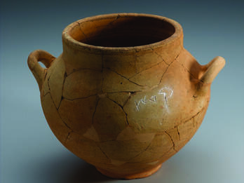 Ceramic pot with two handles and Hebrew inscription.
