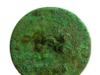 Bronze Mirror A circular metal disc with small handle.