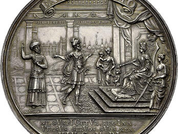 Medal embossed with queen on throne before several people and Latin inscription.