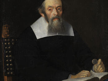 Portrait of Jacob Sasportas Portrait painting of man in robes with collar facing viewer and sitting at a desk, his hands resting on an open book and holding glasses in his left hand.