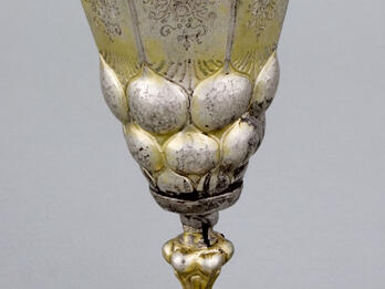Cup engraved with floral motifs.
