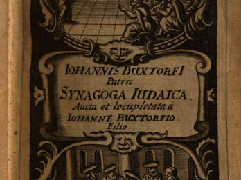 Printed page with Latin text in the center, surrounded by two images, the top of people sitting in front of a teacher and board with Hebrew letters on it, and the bottom of men sitting around a baby. 