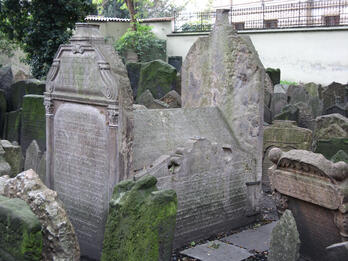 Tomb of Mordechai Meisel Tomb with high tombstones on either end, with Hebrew inscriptions on outside of all sides.