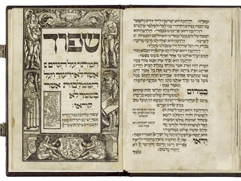 Haggadah from Prague, 1526 Facing-page of printed Hebrew text on right side and illustration on left side of Hebrew text surrounded by four full-length figures, decorative border, and two animal-human hybrids on the bottom of page on either side of shield with lion.