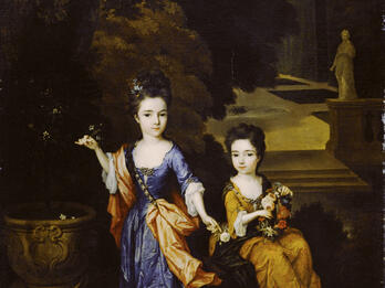 Painting of two girls, one seated and one standing, holding flowers in garden with sculpture and hedges in background.