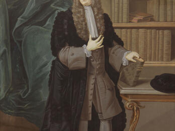 Full-body portrait painting of man wearing periwig and holding a book.