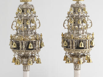 Torah Finials Finials with many layers of branches with bells and topped with crowns.