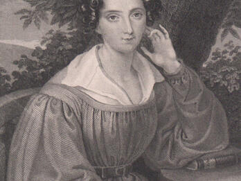 Portrait of Rahel Levin Varnhagen Engraving of woman seated in front of a tree at a table, facing the viewer with her left elbow resting on the table and her right hand holding a book in her lap.