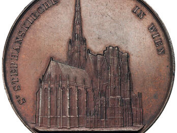 Medal with exterior of cathedral.