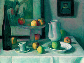 Painting of table with plates, fruit, and bottle with small painting of man on horse in the background.