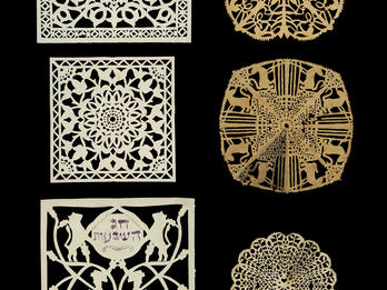 Paper Cuts for Shavuot Six woodcut illustrations featuring mirror images of flowers, animals, designs, and women on vertical plane.