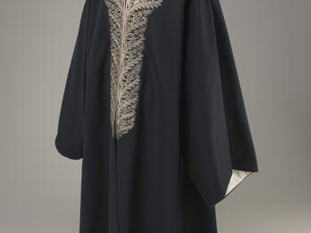 Coat of Rabbi Suleiman Mani, Ottoman Palestine Coat with an ornately embroidered neckline.