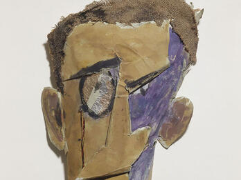 Portrait of Tzara (Mask) Mask with abstract facial features.