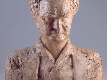 Sculpture of Ben-Gurion Bust sculpture of an elderly man with central bald spot facing viewer.