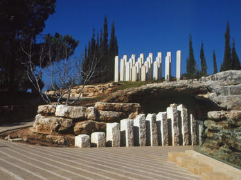 Yad Vashem Children’s Holocaust Memorial, Jerusalem, Israel Monument featuring several stelae of different heights set along a rocky cave.