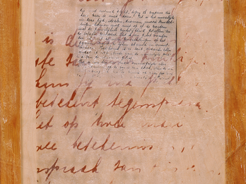 The Diary of Anne Frank (Kristallnacht) Mixed media featuring page with Dutch writing framed with wood.
