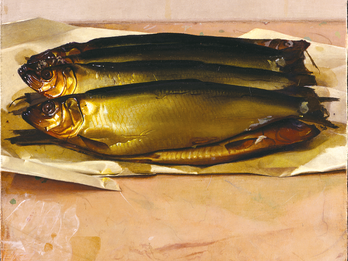 Painting of four fish on paper on a table. 