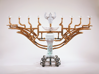 Ceramic menorah with eight copper branches and torso sculpture for center candle. 