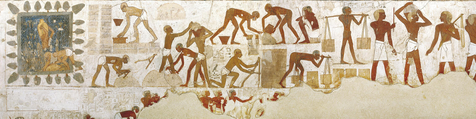 Mural of people carrying bricks, measuring blocks, and pouring buckets. 