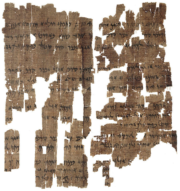 Fragmentary papyrus in several pieces with Aramaic writing. 