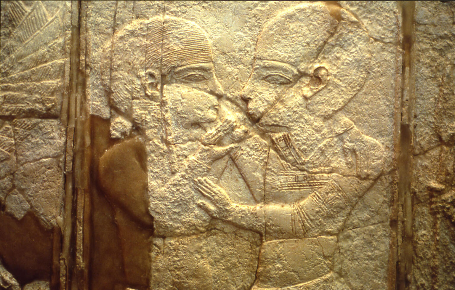 Embracing Couple in Ivory Inlay Ivory inlay of two figures in profile embracing.