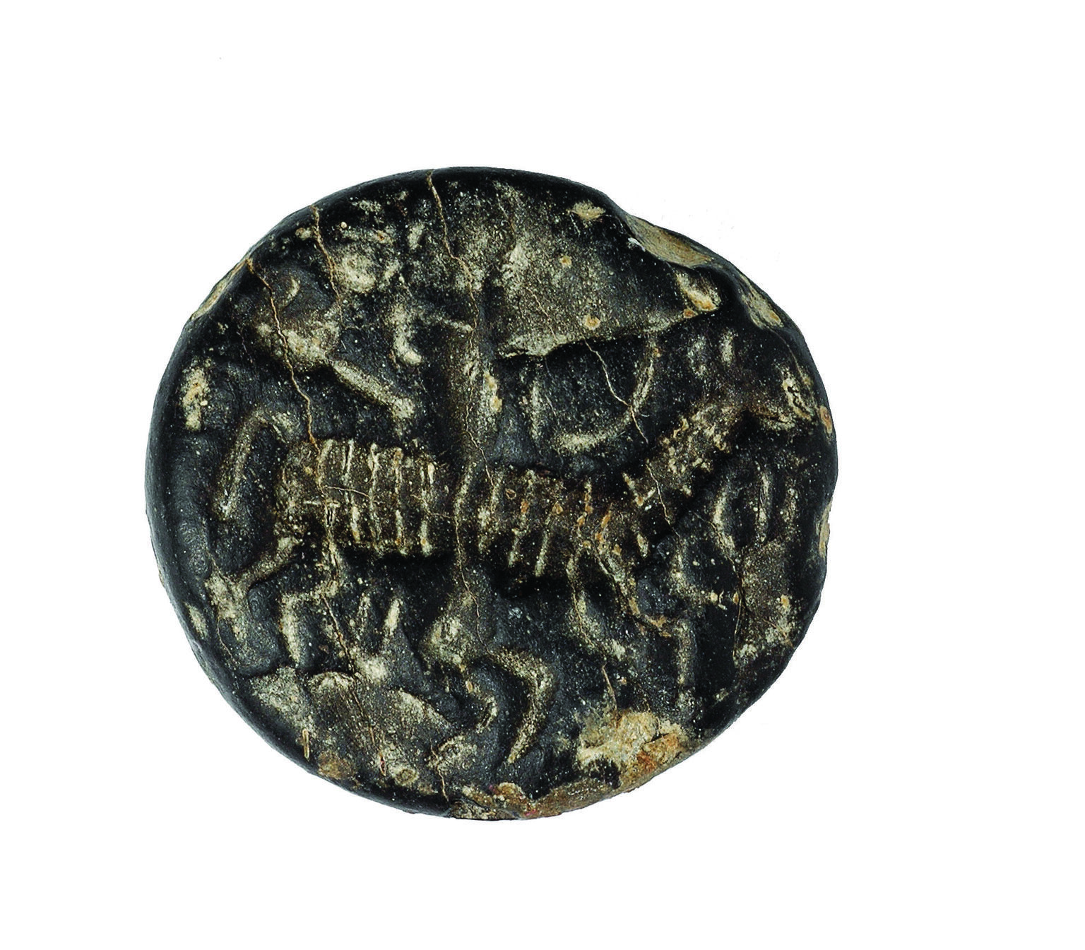 Limestone seal with image of antelope and archer. Limestone seal with image of antelope and archer.