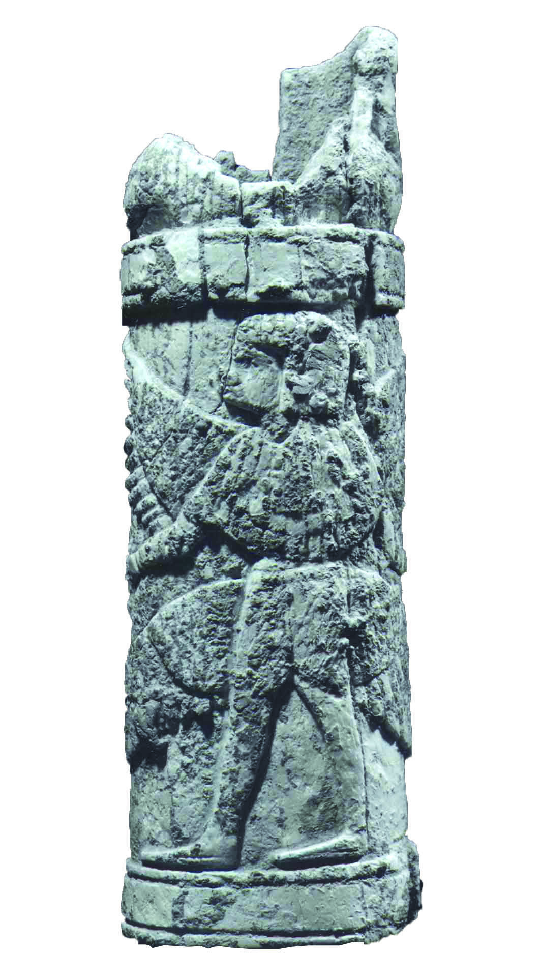 Front of a bone handle with winged humanoid grasping branches of palm tree. Front of a bone handle with winged humanoid grasping branches of palm tree.