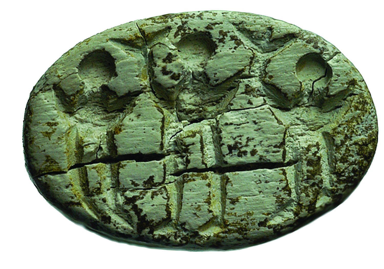 Seal depicting three people with raised arms holding up T-shaped objects. Seal depicting three people with raised arms holding up T-shaped objects.