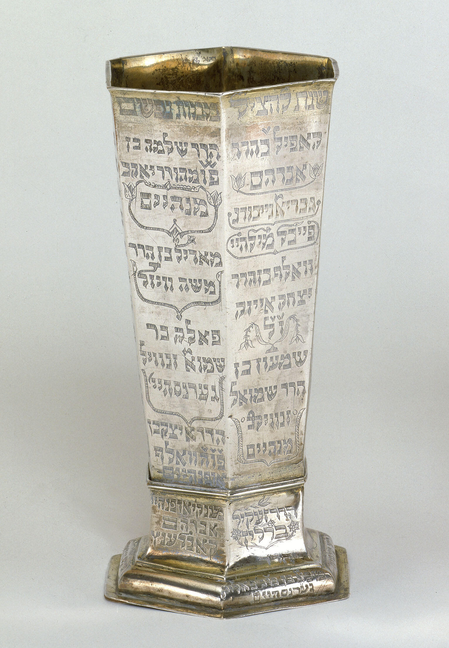 Silver cup with Hebrew inscription. 