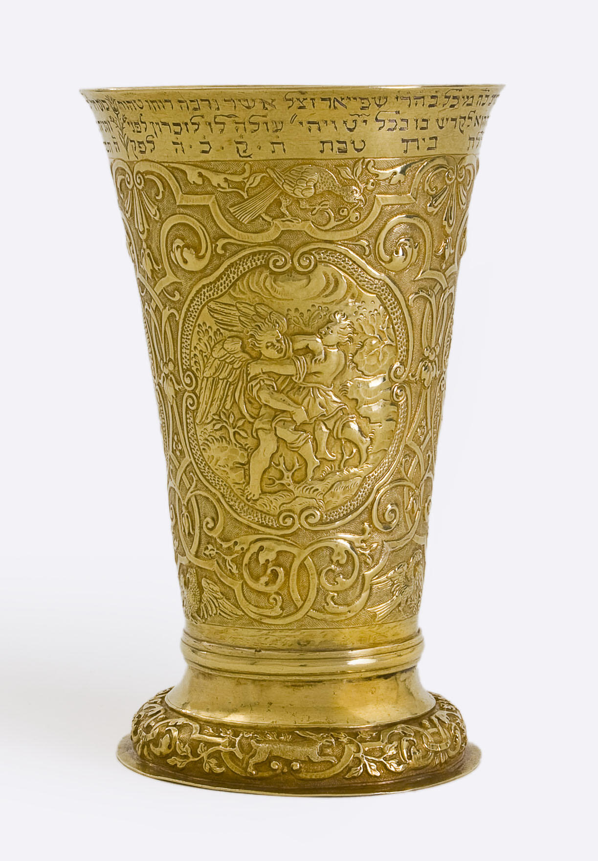 Goblet inscribed with angels, birds, and other animals with a floral motif, and Hebrew text across the lip. Goblet inscribed with angels, birds, and other animals with a floral motif, and Hebrew text across the lip.