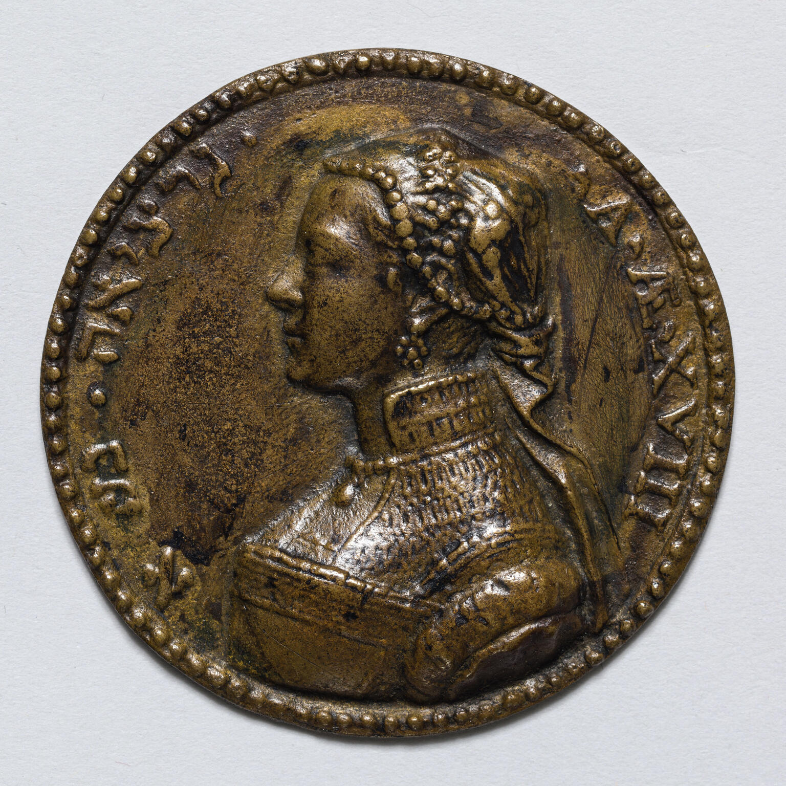 Medal of woman in profile with Hebrew and Latin text around perimeter.