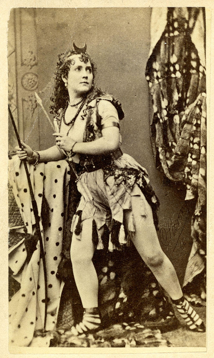 Full body portrait of woman with legs slightly bent and body shifted to one side in an active pose, wearing armor.