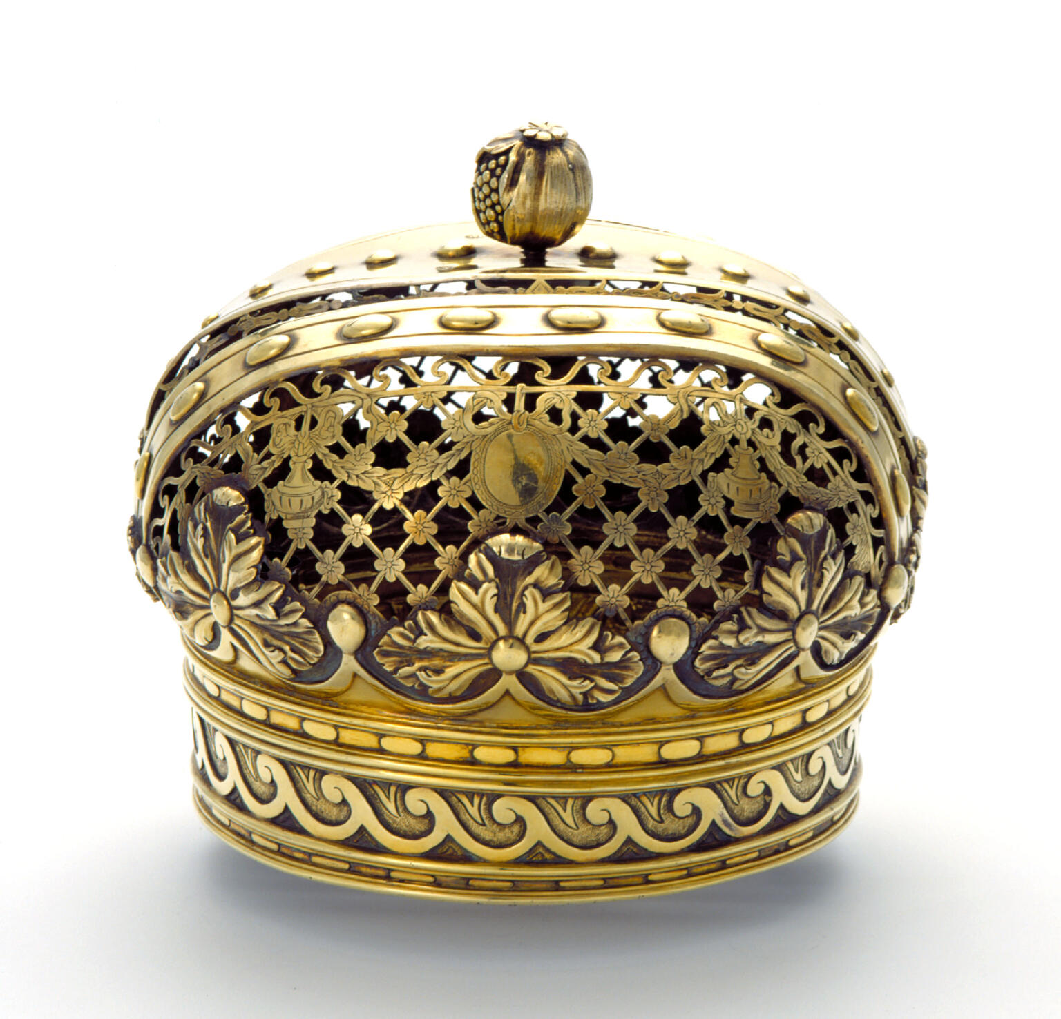Gold crown decorated with floral motifs. Gold crown decorated with floral motifs.