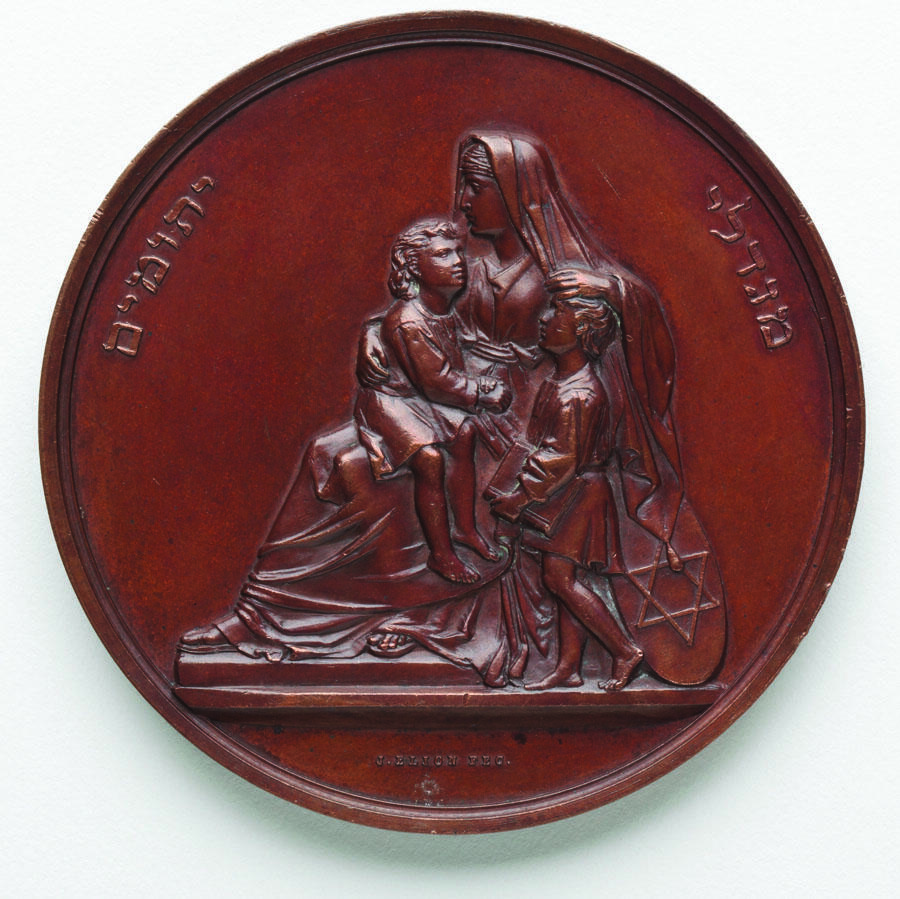 Medal depicting woman with children. Medal depicting woman with children.
